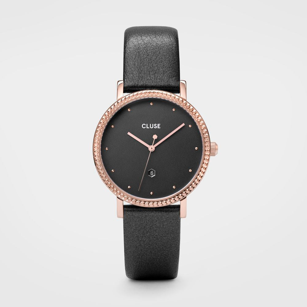 Black watch with rose gold bezel and Cluse brand on a light gray background