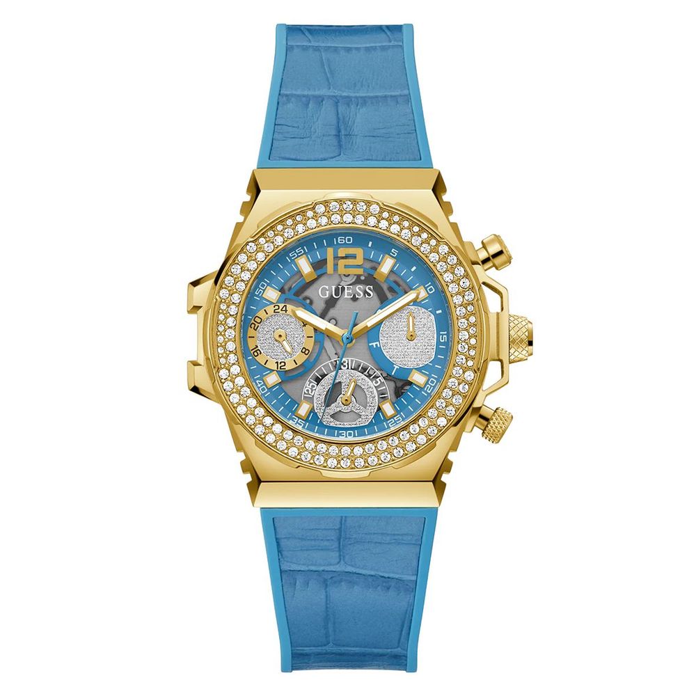 A Guess watch with a golden stainless steel case and a blue silicone bracelet, featuring a blue dial and gold accents.
