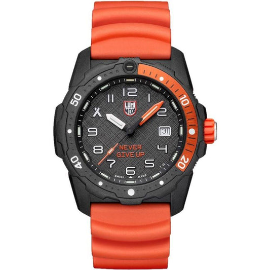 A black and orange Luminox Bear Grylls men's watch with a carbon case and a rubber bracelet.