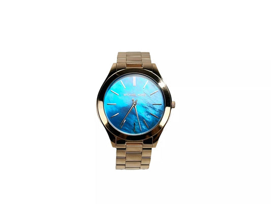 A Michael Kors Slim Runway Stainless Steel Watch with an ocean blue dial and gold unisex band.